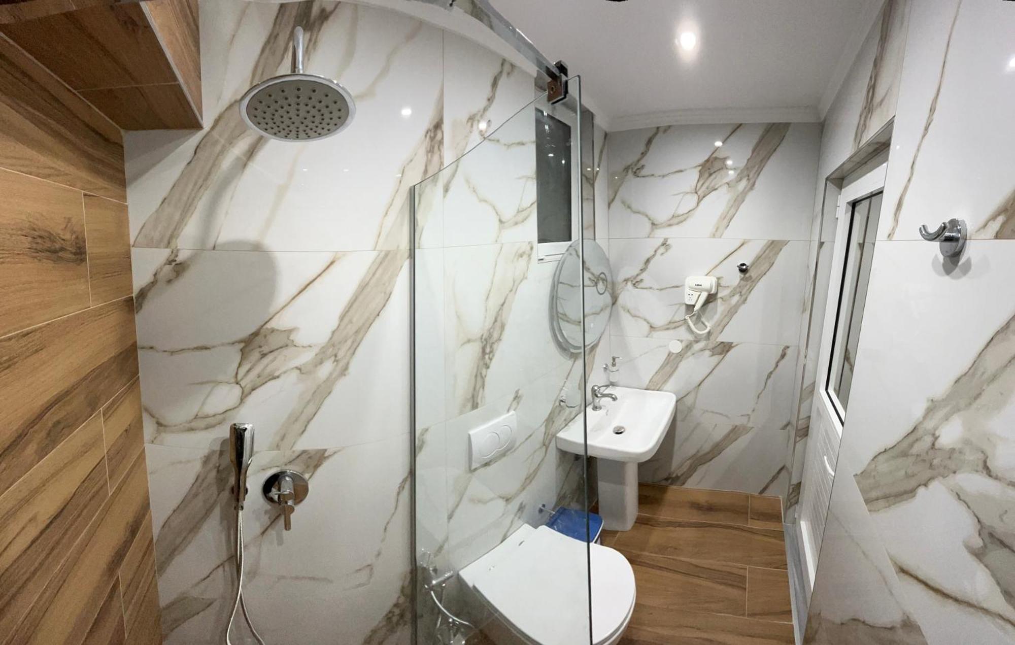 Levend Apartments Ксамил Экстерьер фото